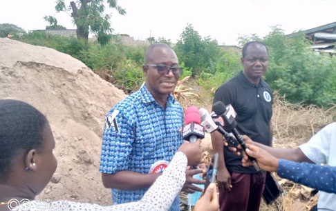 Dr Edmund Sottie speaking to journalists